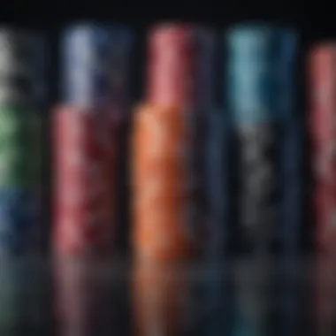 A close-up of poker chips stacked in different colors, representing various betting limits.